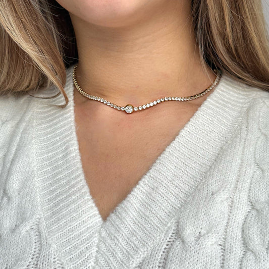 Verfijnde gouden tennis ketting met sprankelende diamanten